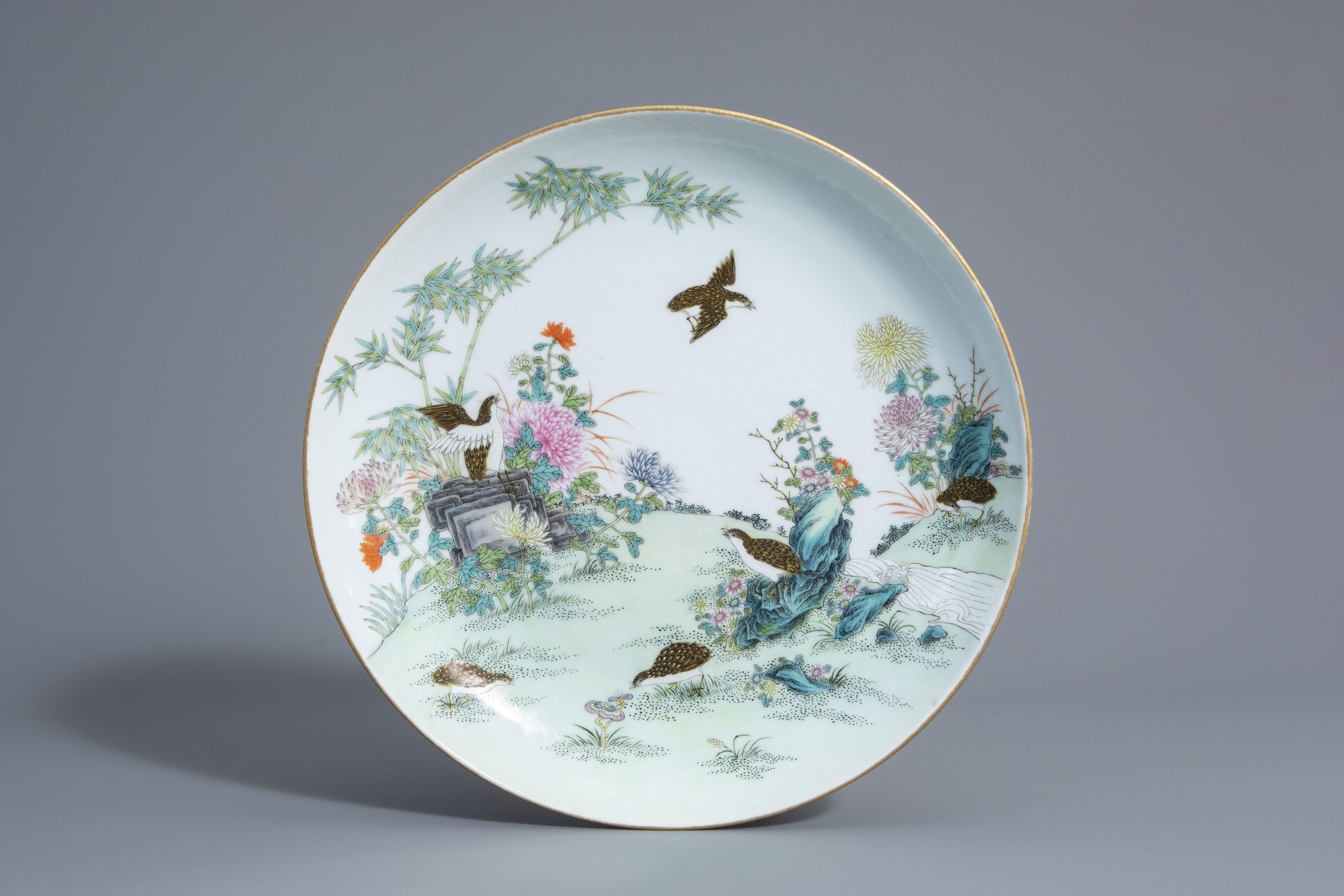 A Chinese famille rose charger with quails among flower branches, Guangxu mark, 20th C.