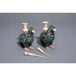 A pair of Chinese mother-of-pearl, turquoise and bone bird shaped joss stick holders, 19th/20th C.