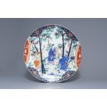 A large Japanese Imari charger with figures in a landscape, Meiji, 19th/20th C.