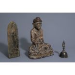 A wooden Buddha, a votive bronze plaque and a ritual bell, Burma and/or Tibet, 17th/19th C.