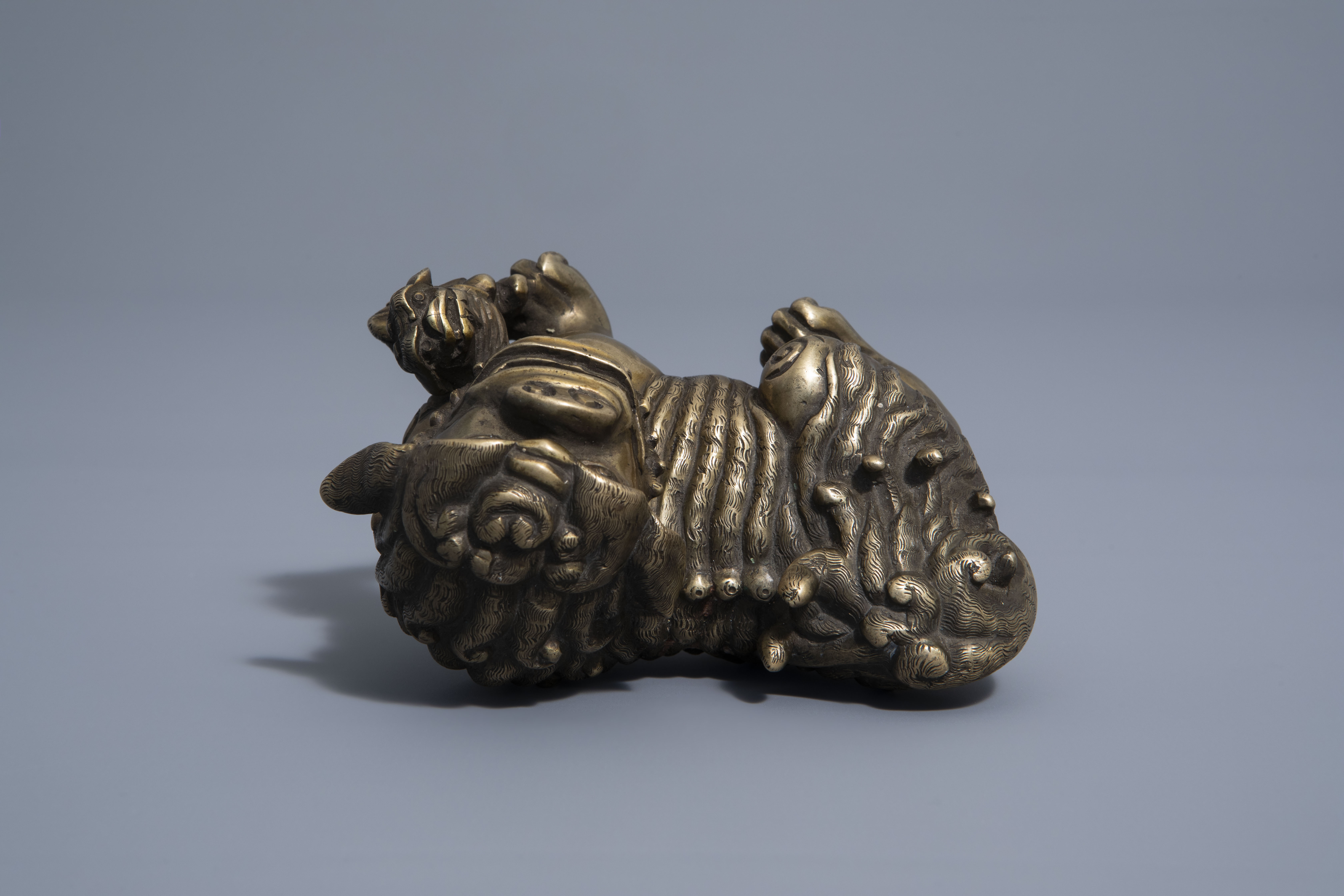 A Chinese bronze model of a Buddhist lion, late Qing - Image 7 of 7