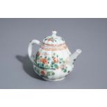 A Chinese famille verte teapot and cover with floral design, Kangxi