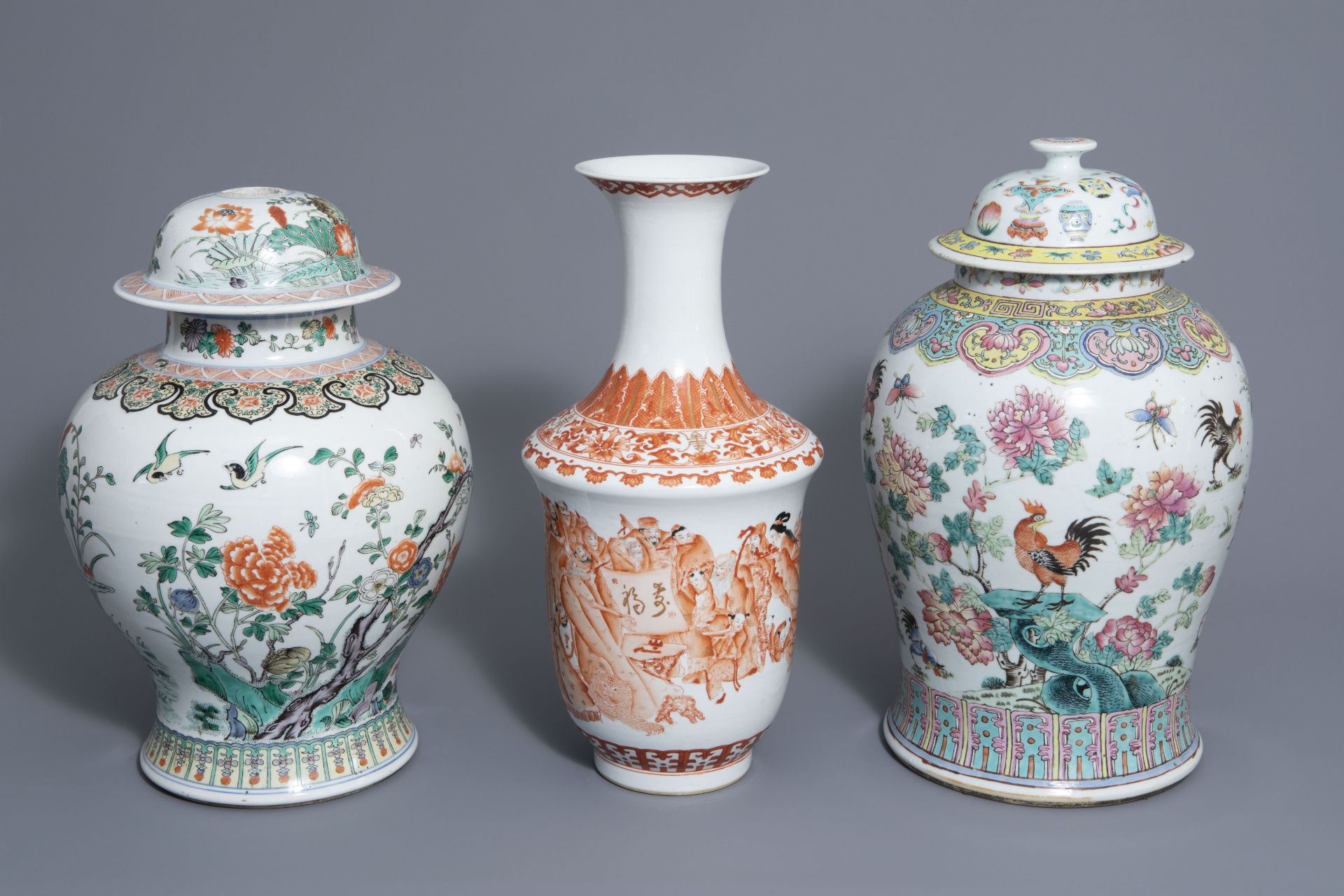 Three Chinese famille rose, verte and iron red vases with different designs, 19th/20th C.