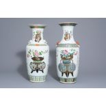 Two Chinese famille rose vases with flower baskets, 19th/20th C.