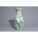 A Chinese famille rose 'phoenixes' vase, 19th C.