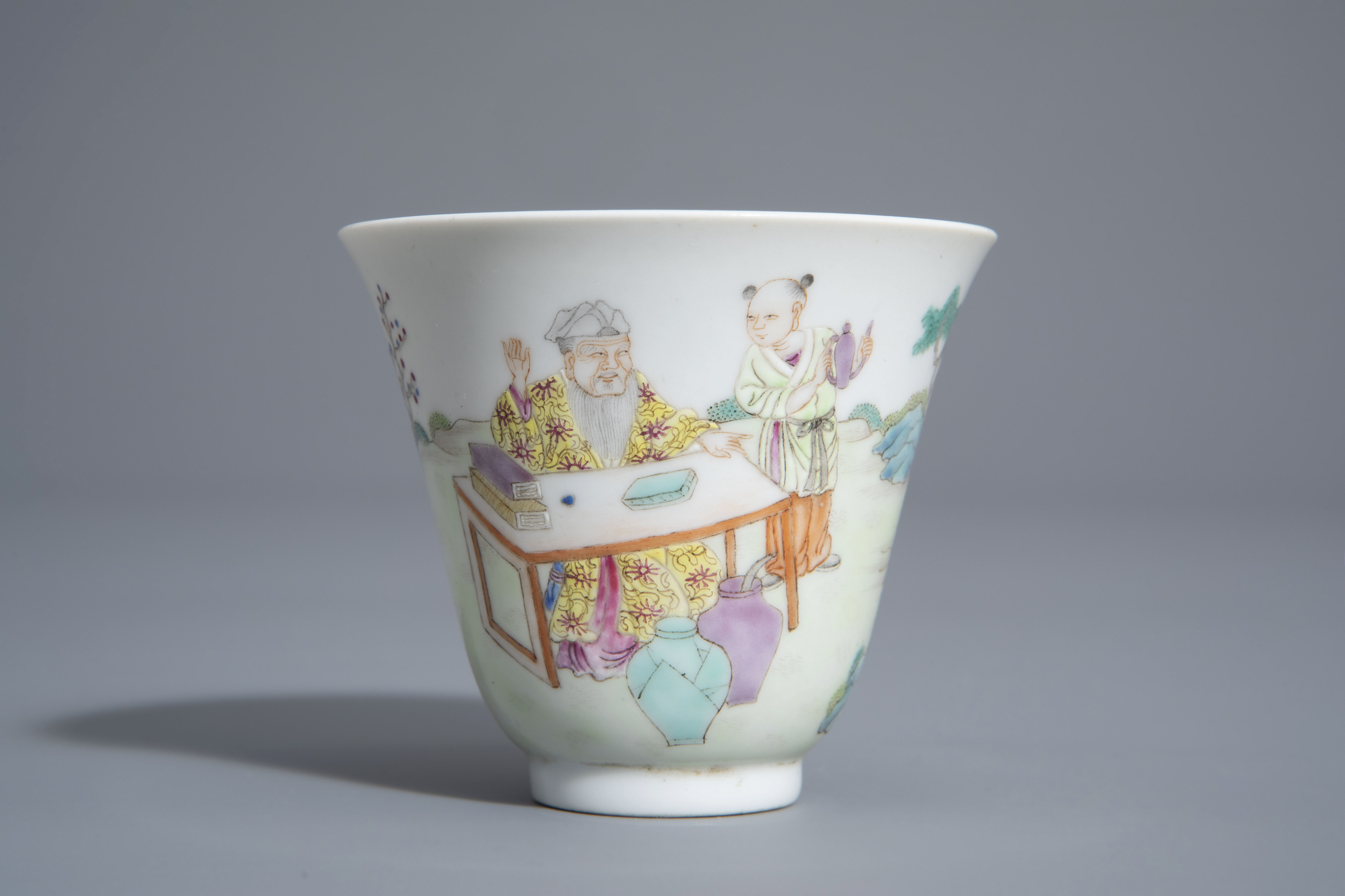 A Chinese famille rose cup and a saucer with different designs, 19th/20th C. - Image 5 of 11