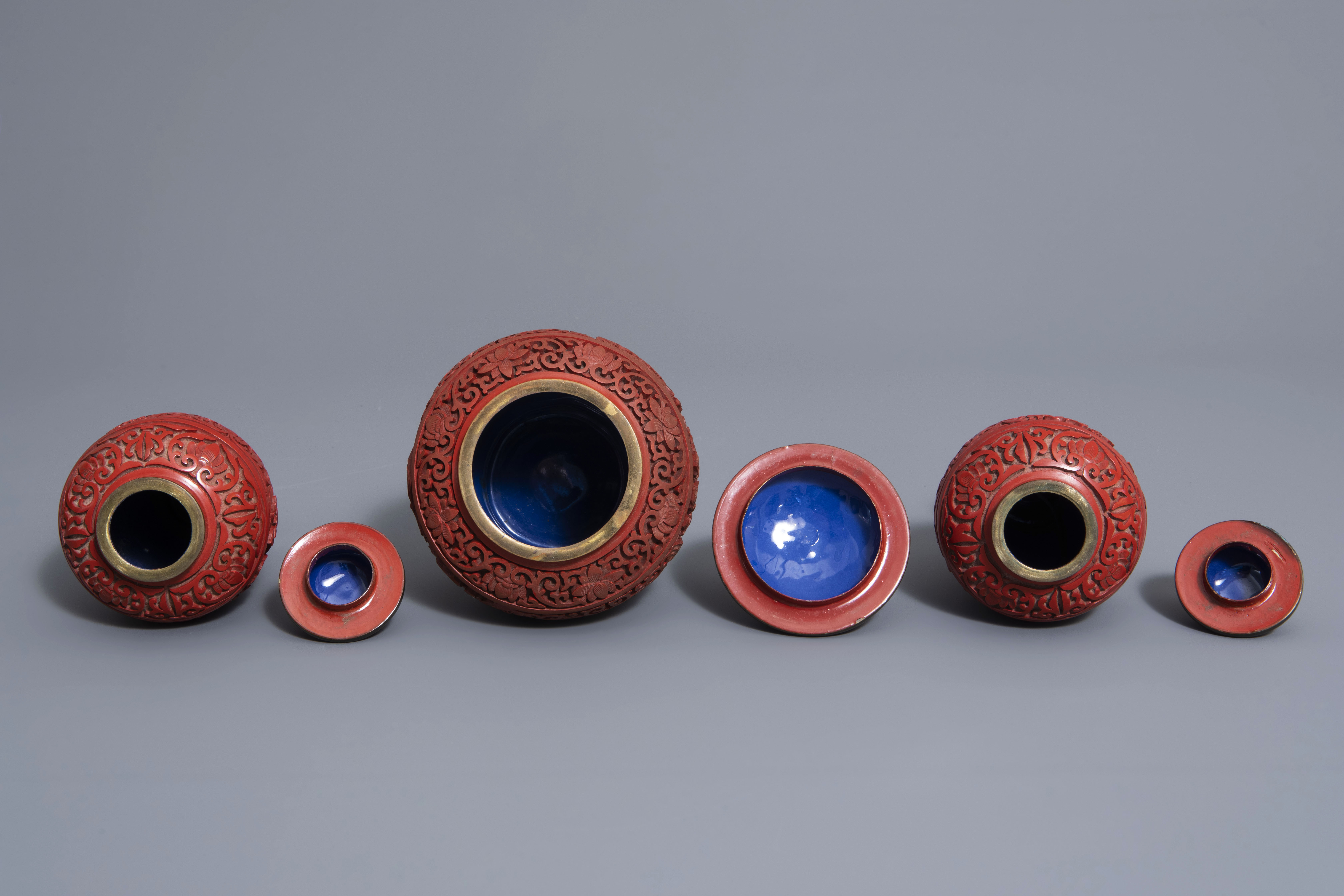 A Chinese tea block, cloisonné teapot, wall vase, bamboo brush pot & 3 red lacquer vases, 20th C. - Image 6 of 16