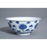 A Chinese blue and white 'lotus scroll' bowl, Kangxi mark, 19th/20th C.