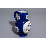 A polychrome Brussels faience 'Napoleon' jug, 19th C.