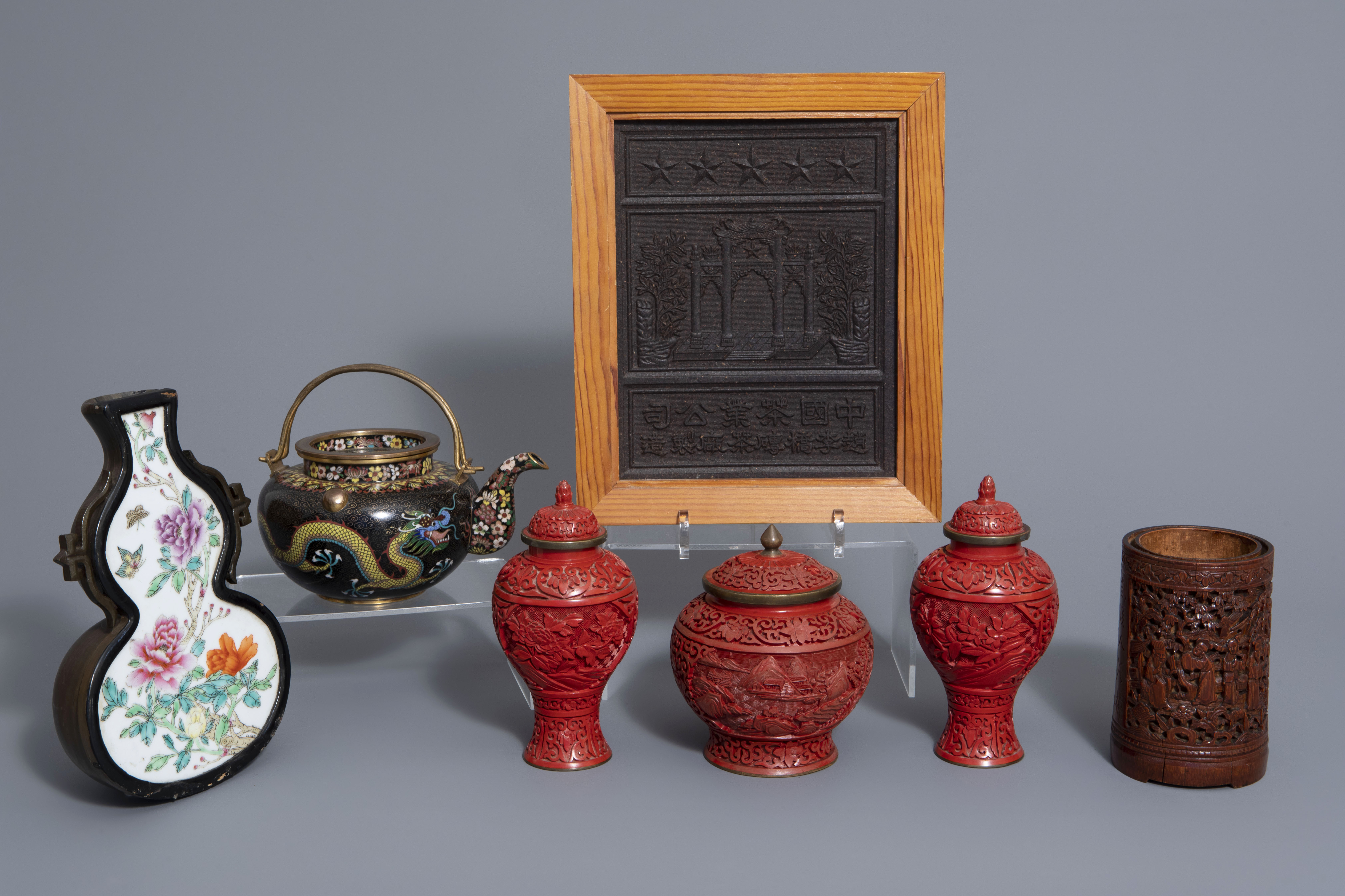 A Chinese tea block, cloisonné teapot, wall vase, bamboo brush pot & 3 red lacquer vases, 20th C.