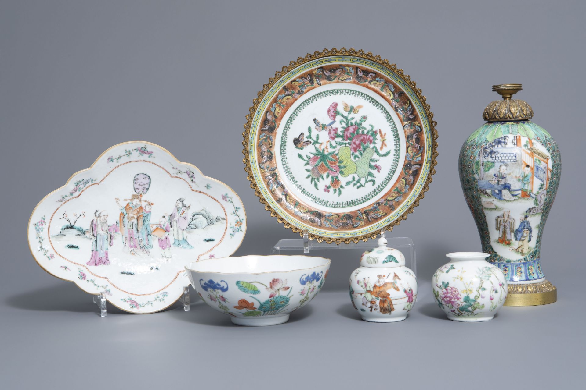 Three Chinese famille rose vases, two bowls and a plate with different designs, 19th C.