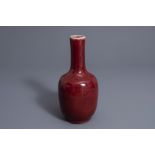 A Chinese sang de boeuf glazed bottle vase, Kangxi mark, 19th C.