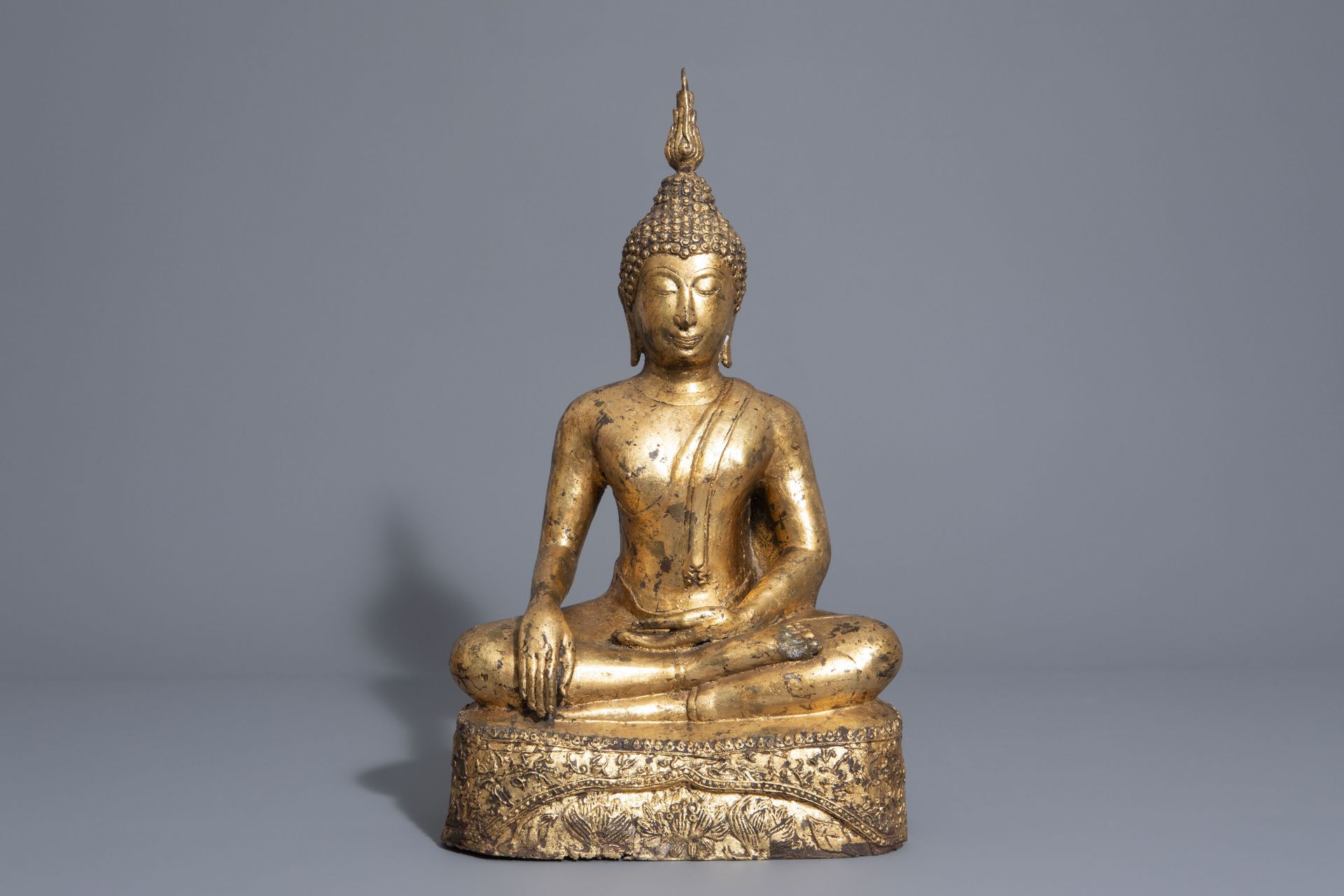 A gilt bronze figure of a seated Buddha, Thailand or Cambodia, 19th/20th C.