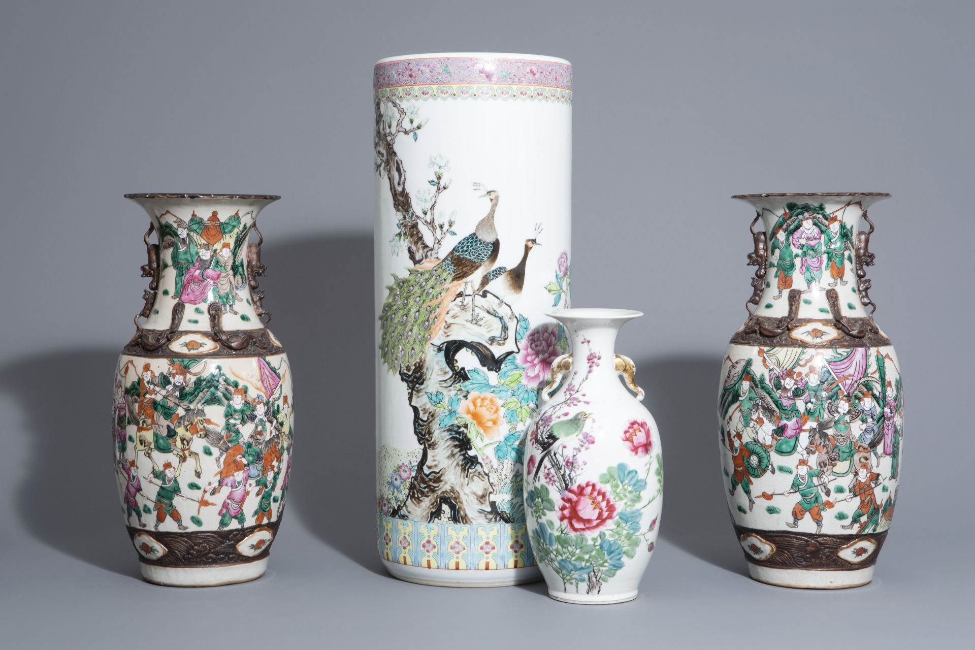 Four Chinese famille rose, qianjiang cai and Nanking crackle glazed vases, 19th/20th C.