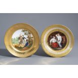 Two parcel gilt porcelain plates with Russian designs, Paris, early 19th C.