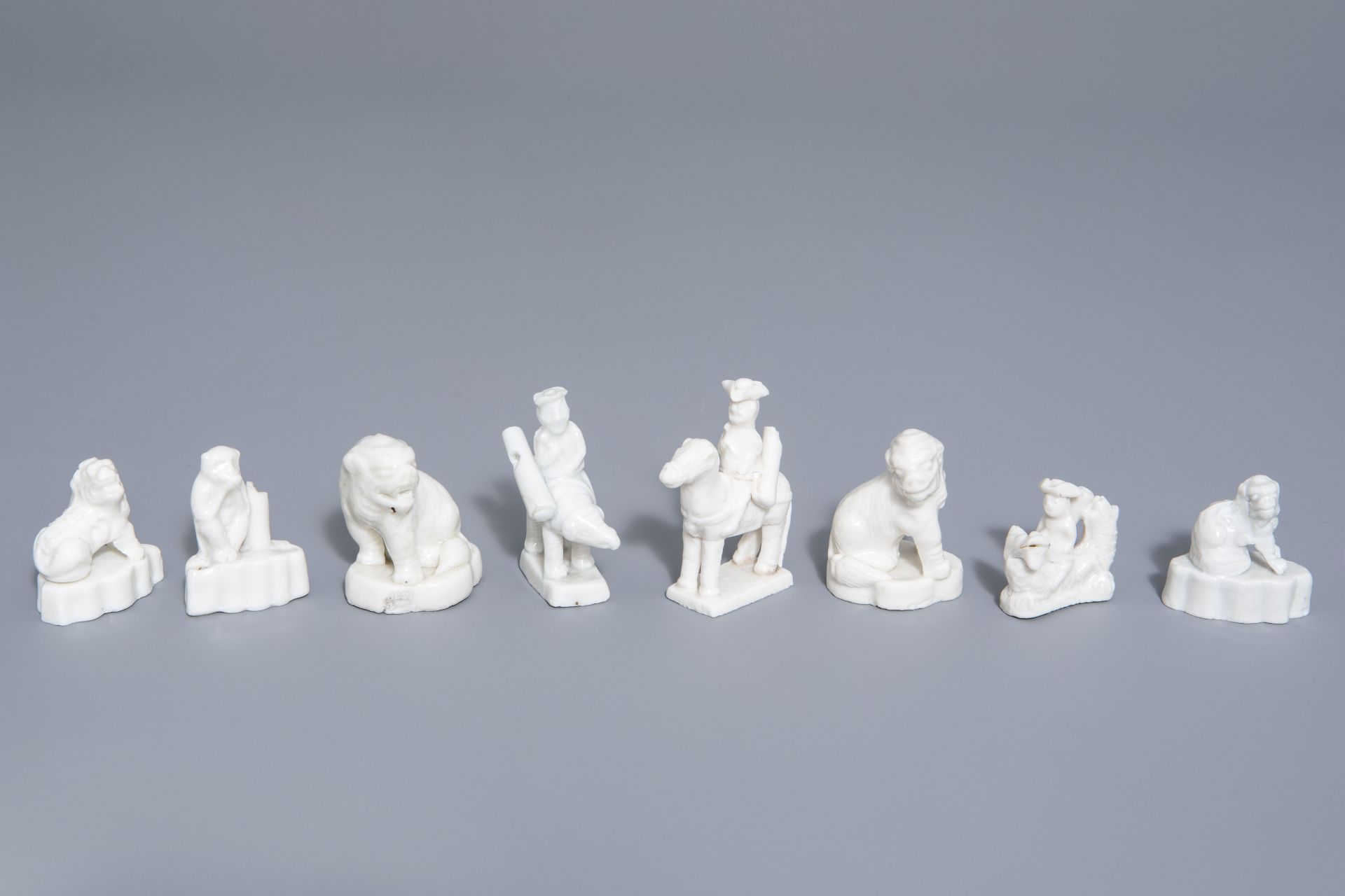 Eight Chinese Dehua blanc de Chine minature figures and whistles, Kangxi