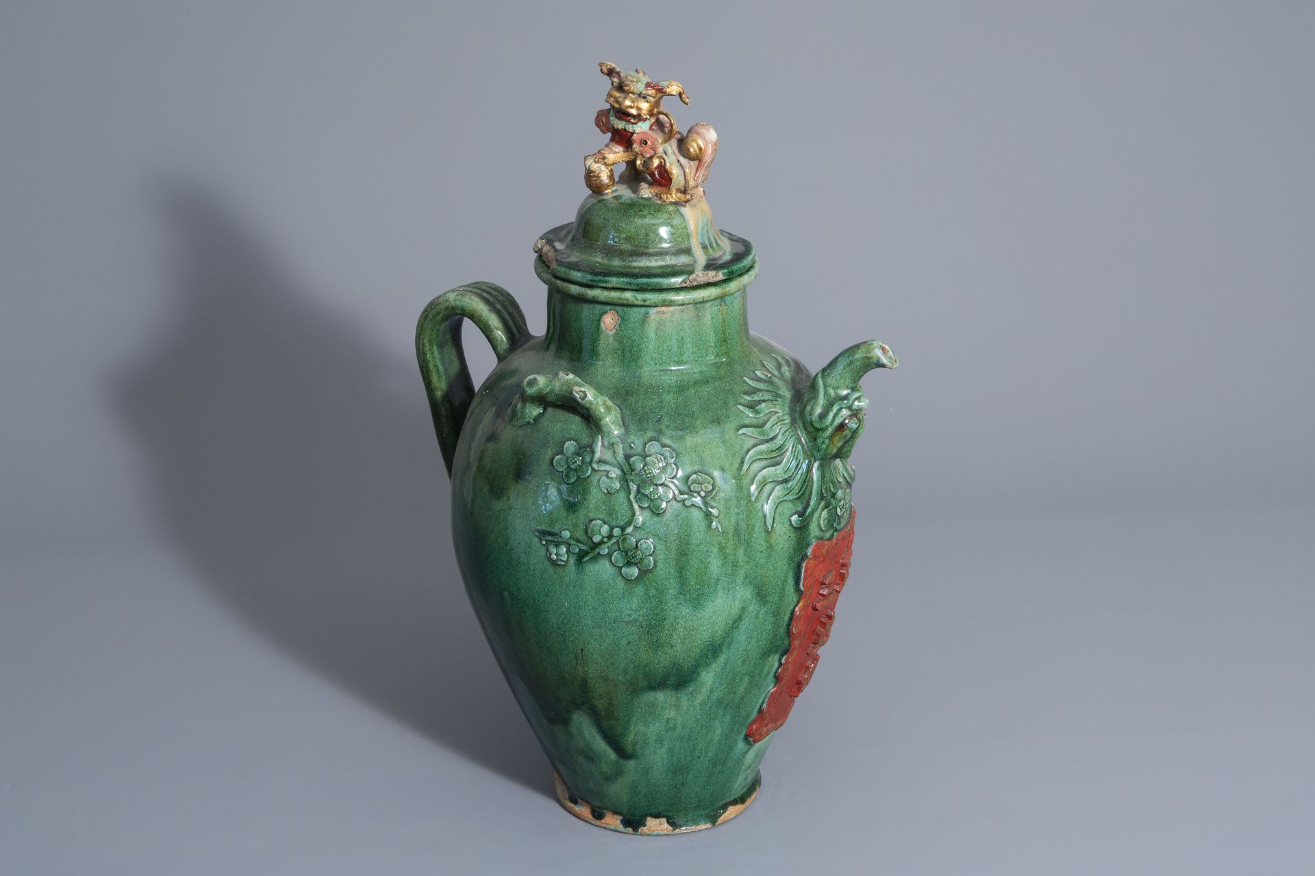 A large Chinese green glazed jug/jar with inscription, early 20th C.