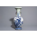 A Chinese blue and white Nanking crackle glazed vase with birds on blossoming branches, 19th C.