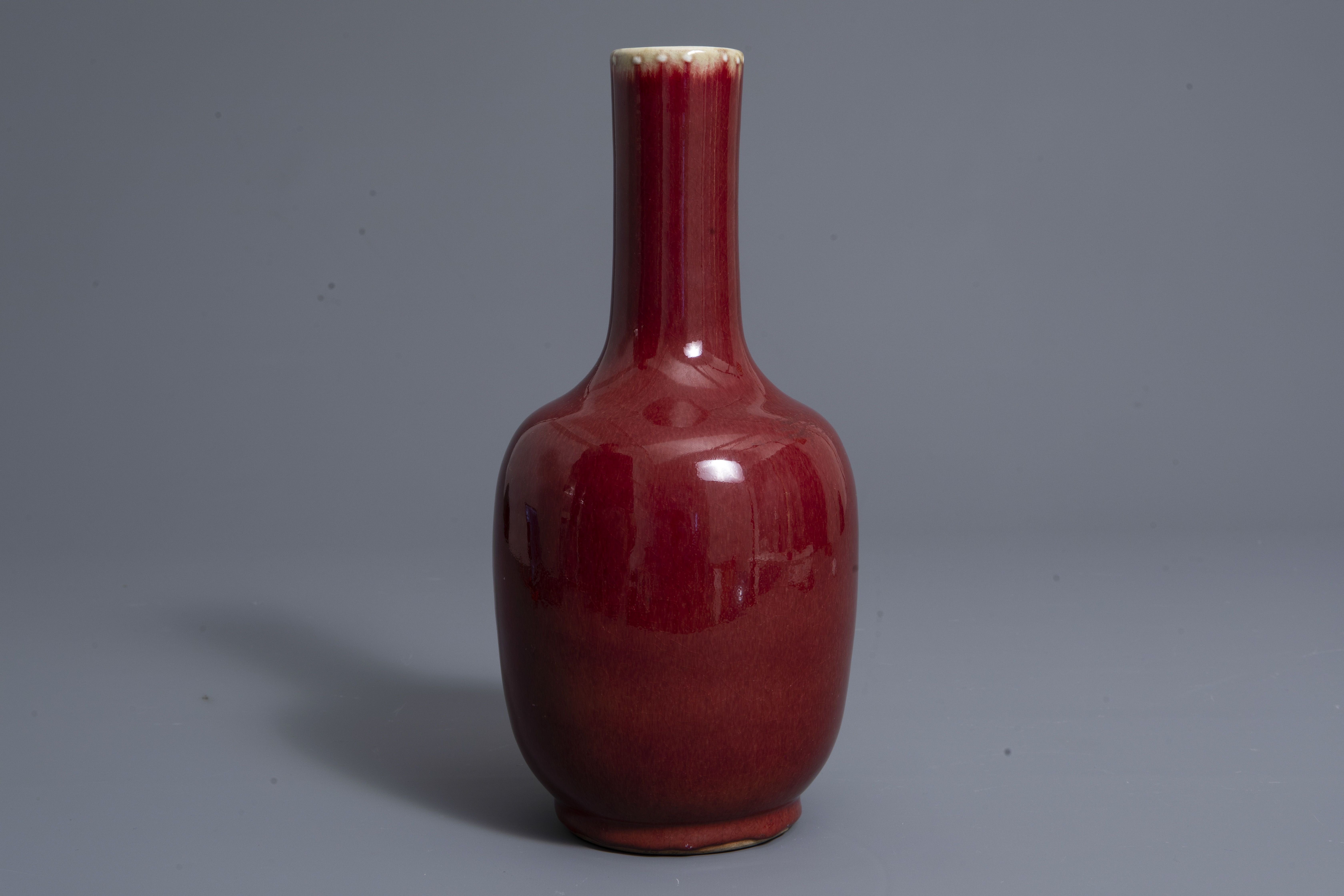 A Chinese sang de boeuf glazed bottle vase, Kangxi mark, 19th C. - Image 5 of 7