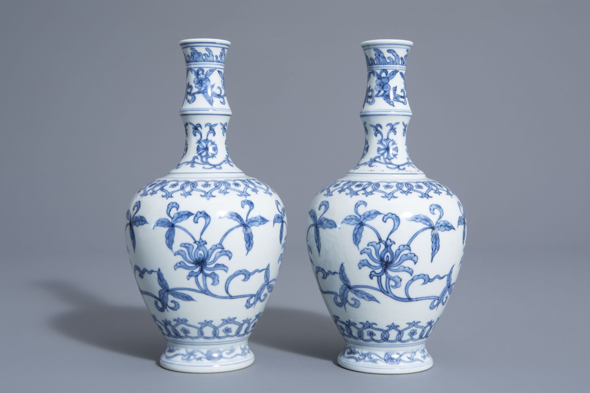 A pair of Chinese blue and white vases with floral design, Chenghua mark, 19th/20th C.