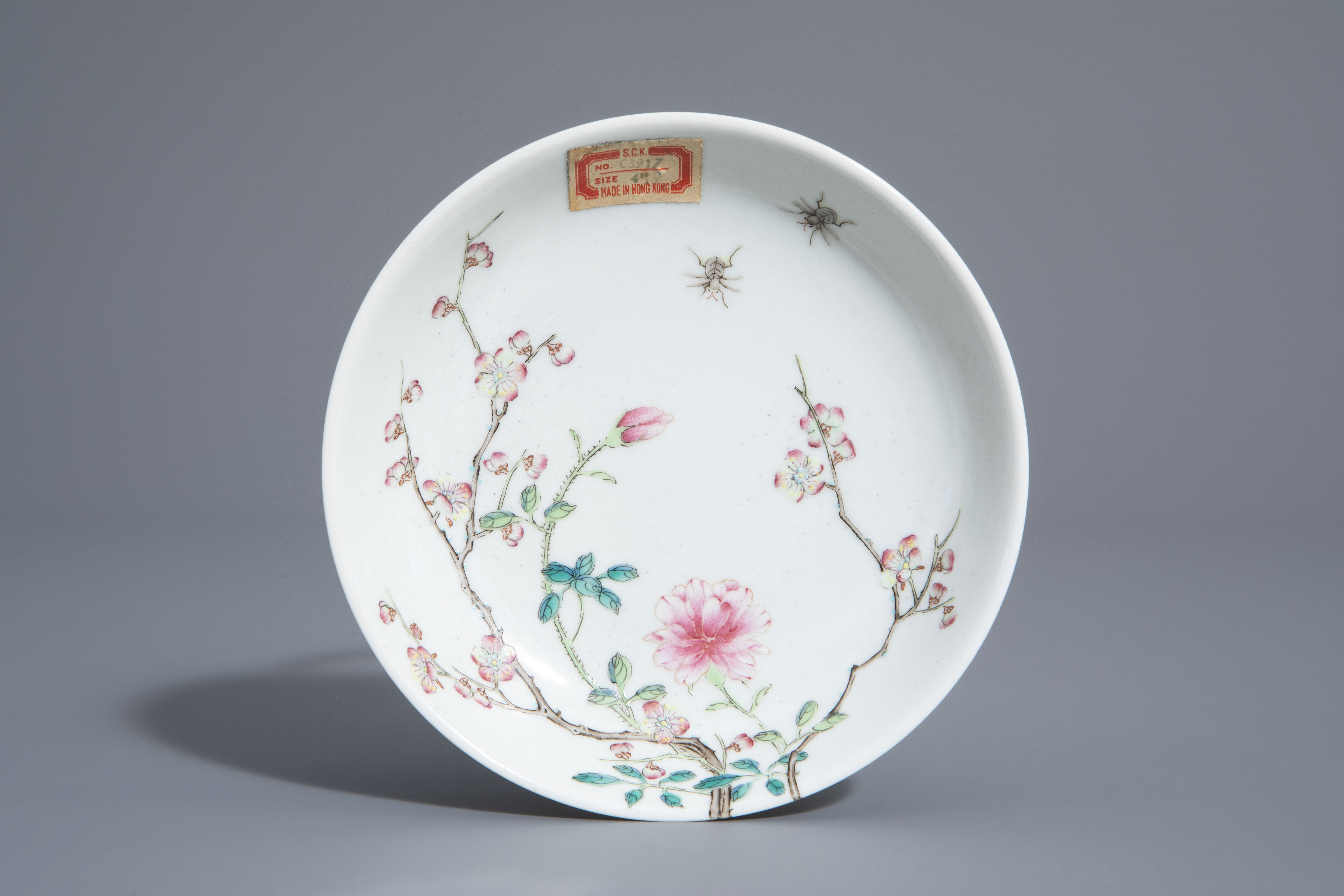 A Chinese famille rose cup and a saucer with different designs, 19th/20th C. - Image 2 of 11