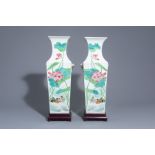 A pair of square Chinese famille rose vases with ducks in a lotus pond, 19th/20th C.