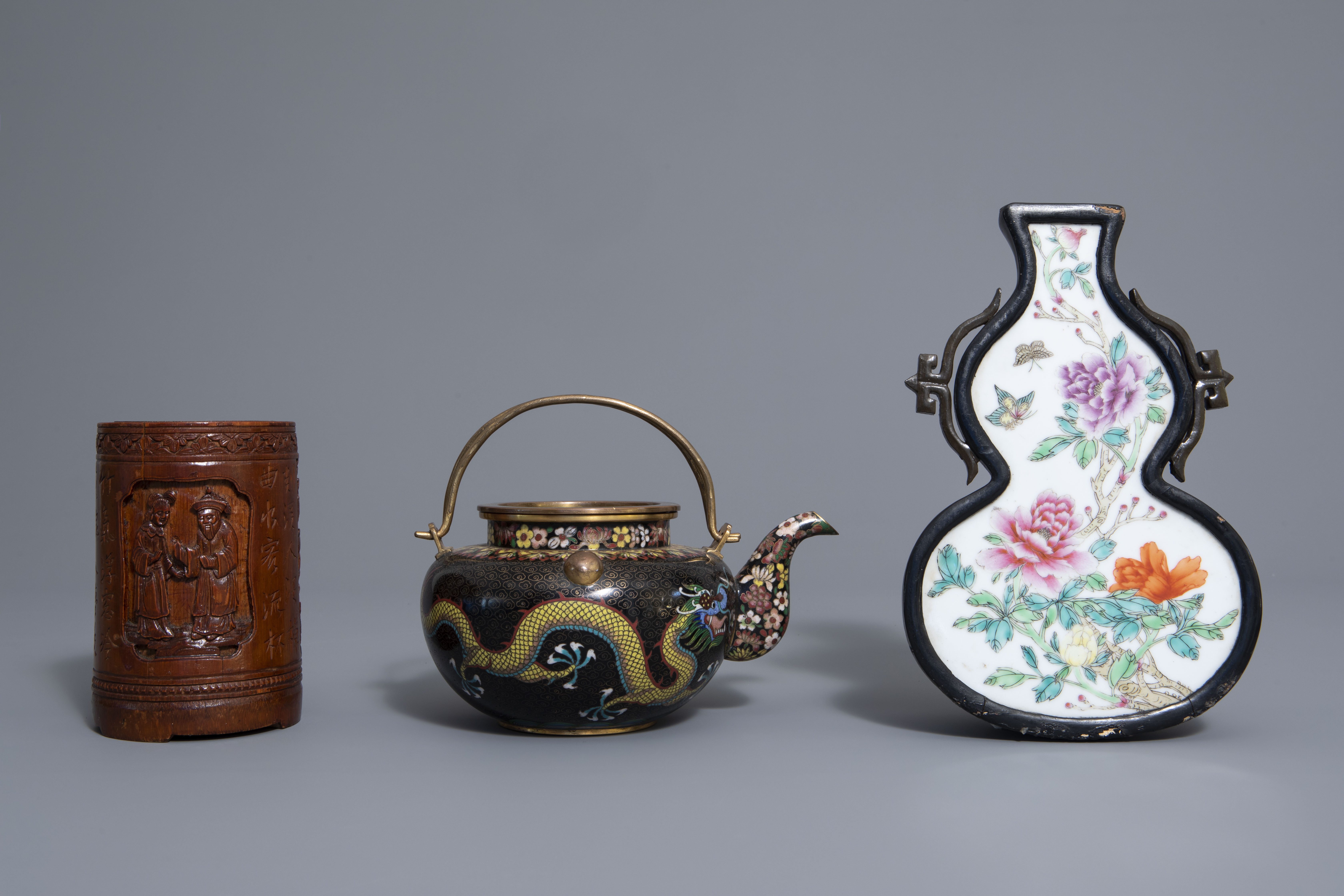 A Chinese tea block, cloisonné teapot, wall vase, bamboo brush pot & 3 red lacquer vases, 20th C. - Image 10 of 16