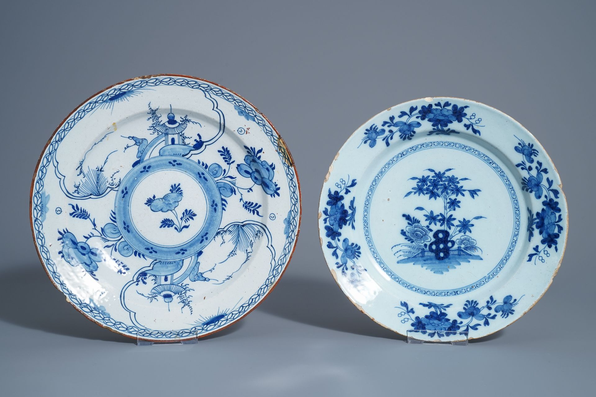 Twelve polychrome and blue and white Dutch Delft plates and an oval tray, 18th C. - Image 2 of 13