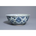 A Chinese blue and white bowl with lotus scrolls, Ming, 15th/16th C.