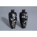 A pair of Japanese cloisonné vases with birds among blossoming branches, Meiji, 19th/20th C.