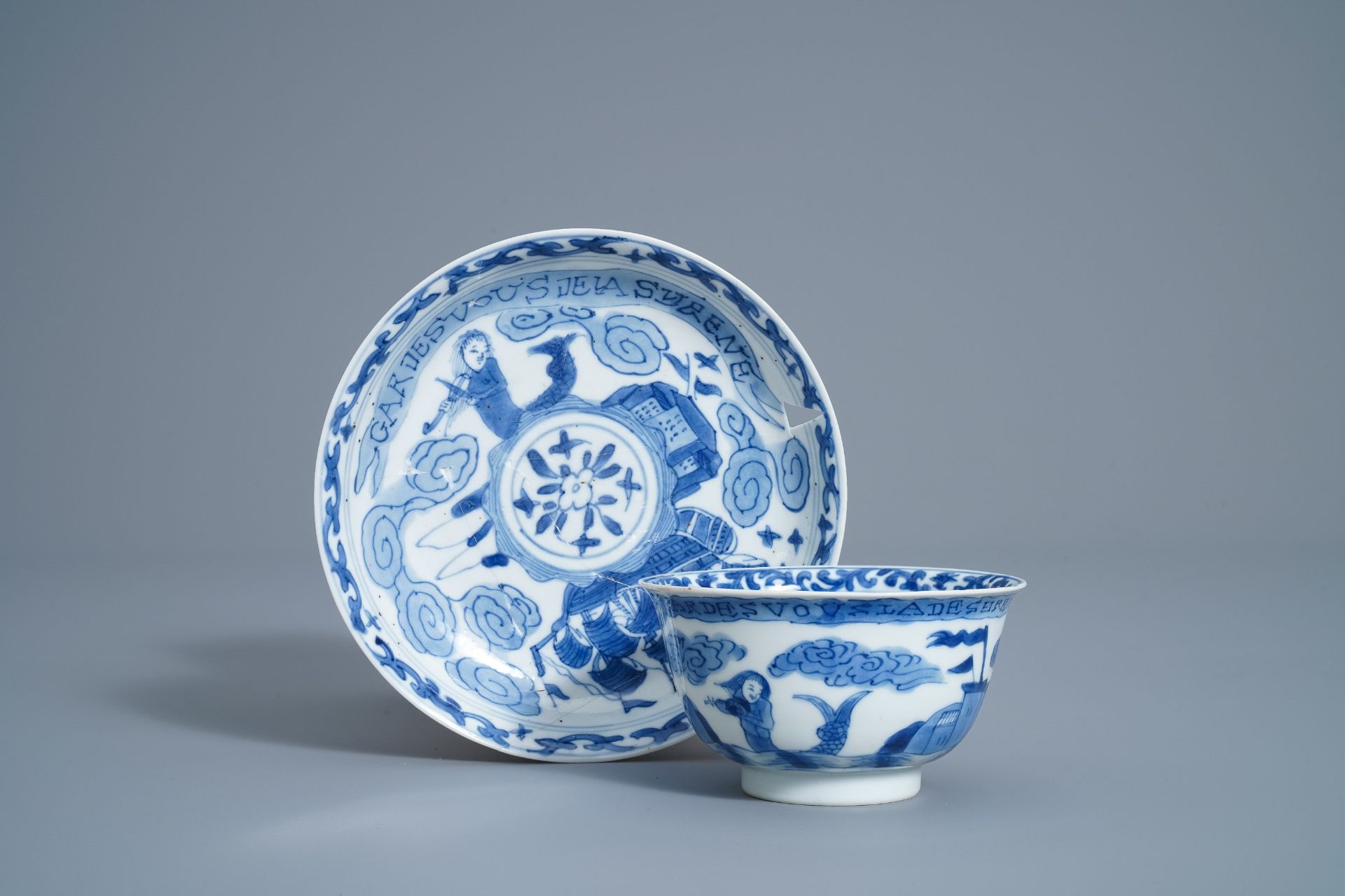 A Chinese blue and white French market cup and saucer, Kangxi