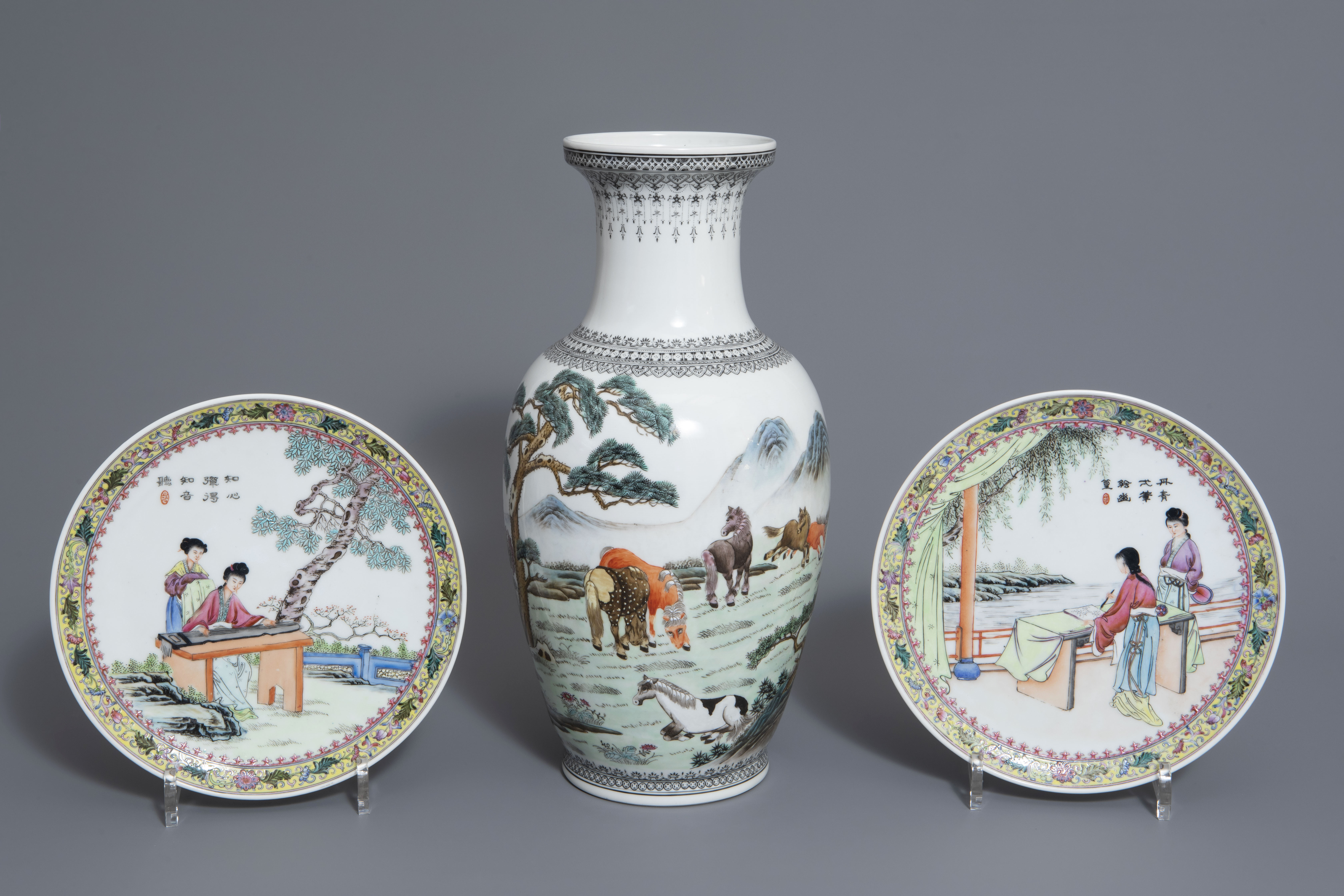 A pair of Chinese famille rose plates and a 'Horses of Mu Wang' vase, 20th C.