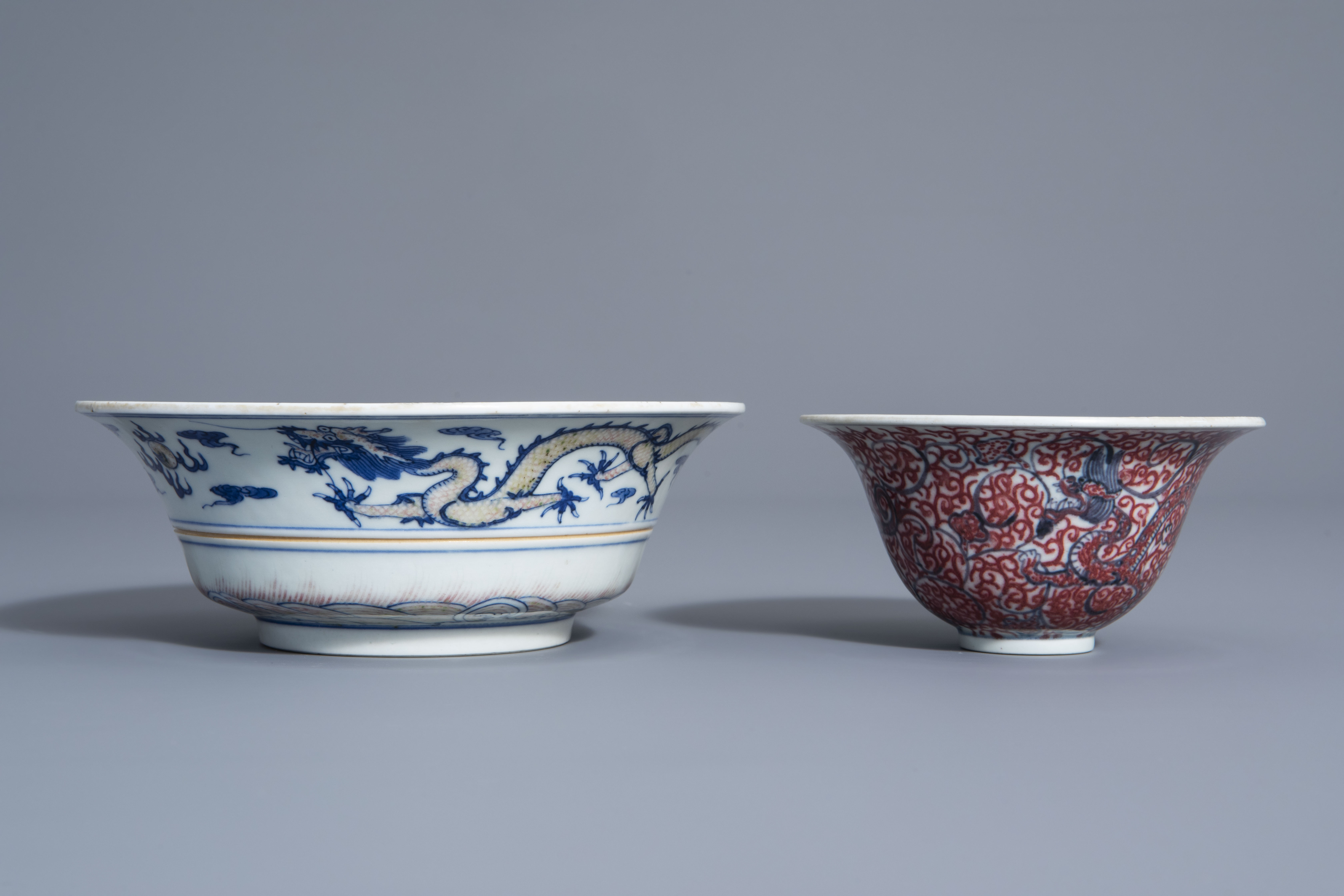 Two Chinese blue, white and copper red bowls, Kangxi mark, 19th/20th C. - Image 2 of 7