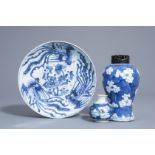 Two Chinese blue and white vases and a dish with different designs, Kangxi