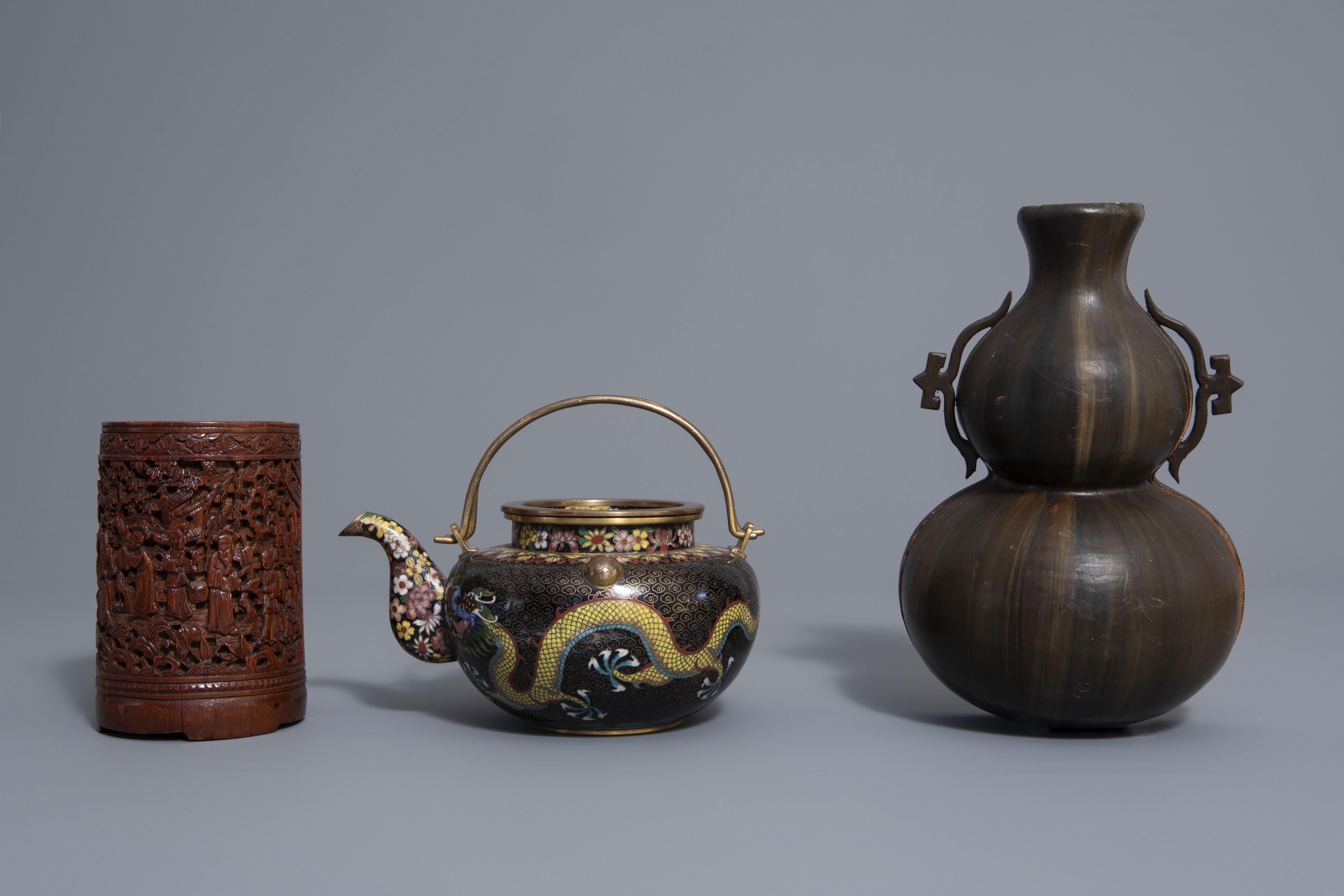 A Chinese tea block, cloisonné teapot, wall vase, bamboo brush pot & 3 red lacquer vases, 20th C. - Image 12 of 16