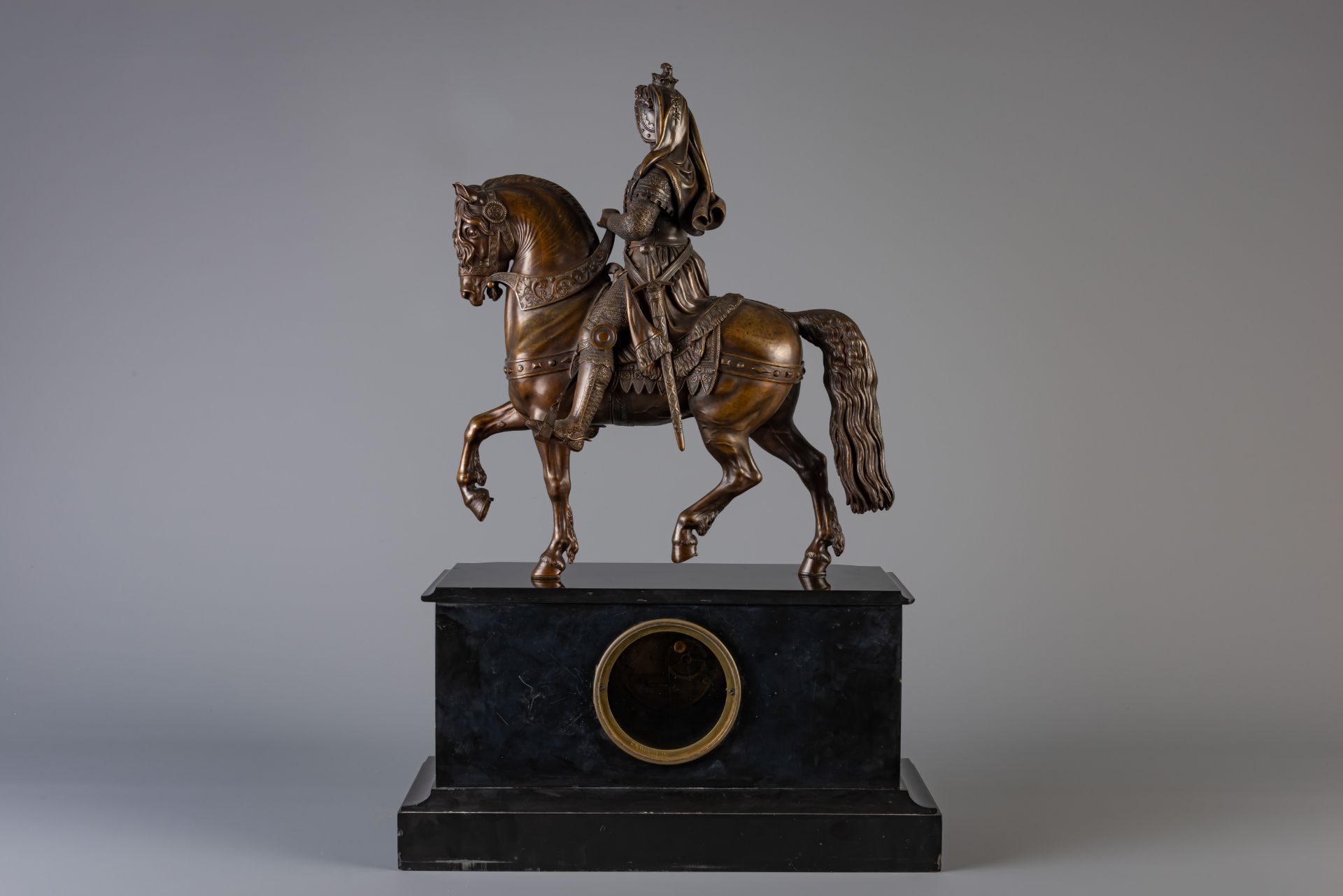 A black marble mantel clock with on top a patinated bronze crusader on his horse, France, 19th C. - Image 3 of 8