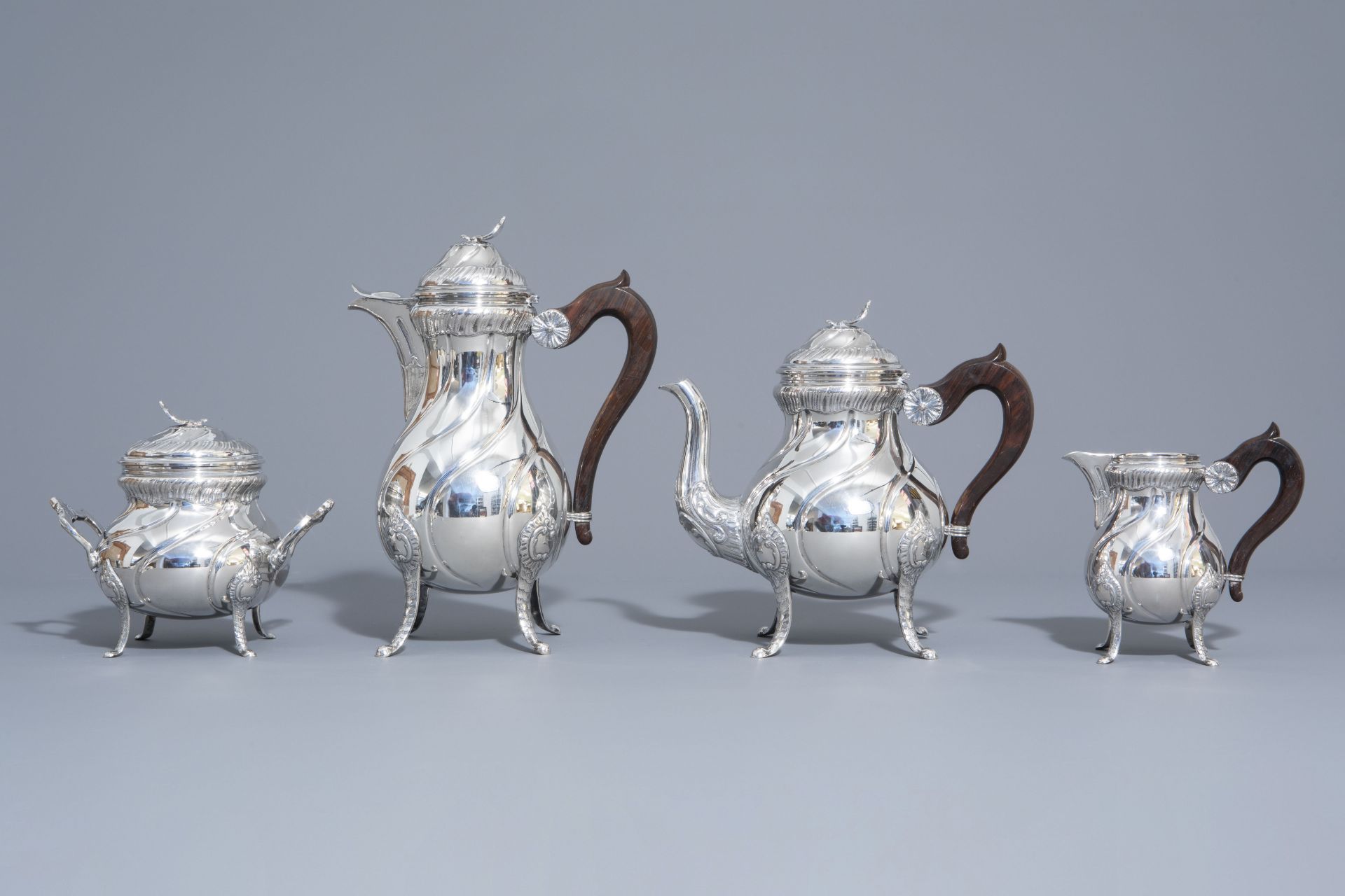 A four-piece Rococo revival silver coffee and tea set, 800/000, 20th C. - Image 4 of 13