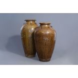 Two large monochrome brown glazed martaban jars, South-East Asia, 19th C.