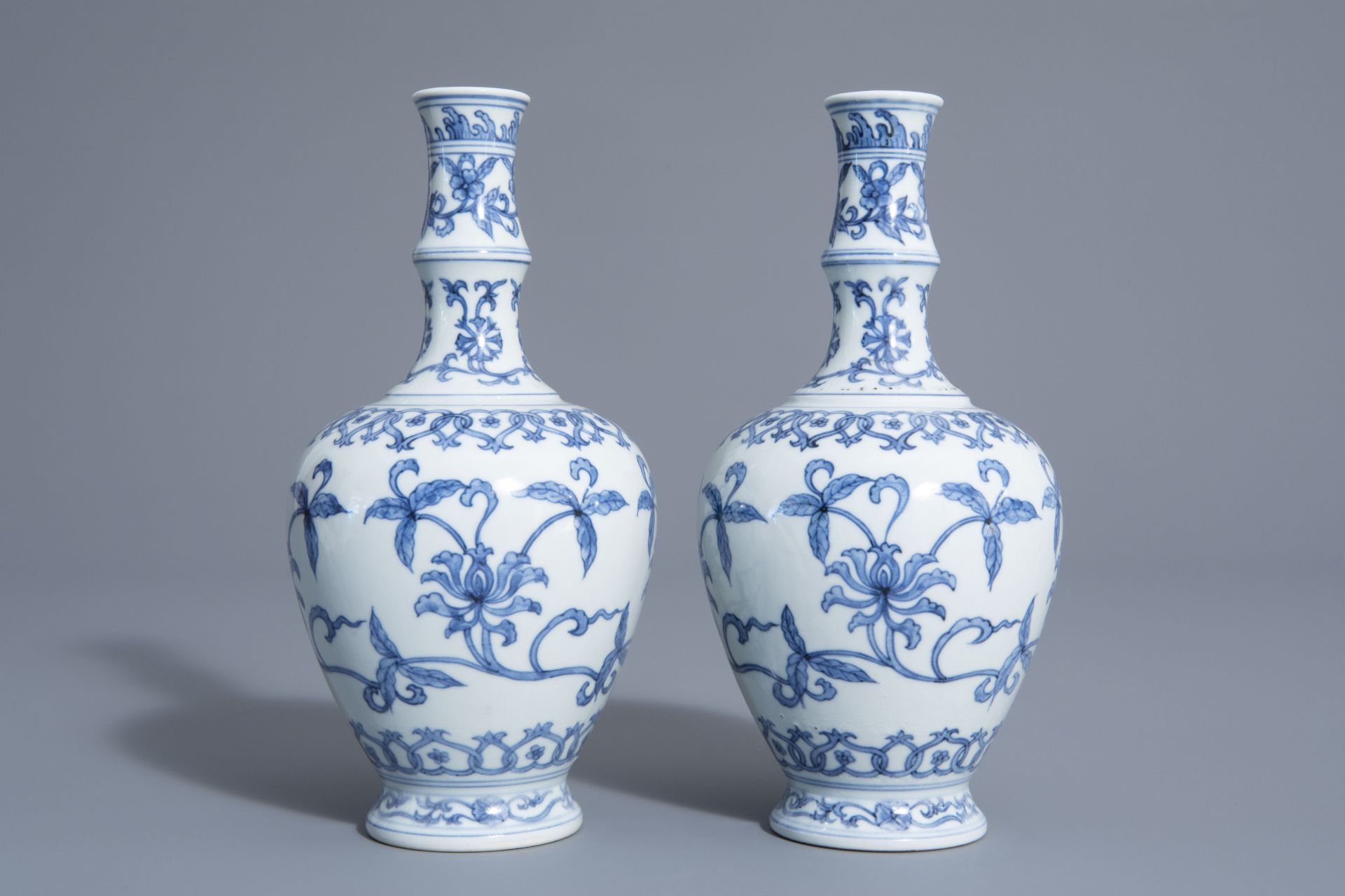 A pair of Chinese blue and white vases with floral design, Chenghua mark, 19th/20th C. - Image 2 of 6