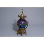 A French flambŽ glazed vase with gilt bronze chinoiserie mounts, 19th C.