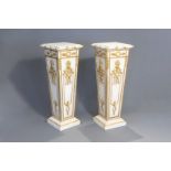 A pair of fine gilt and patinated wooden Empire style pedestals, presumably Italy, 20th C.