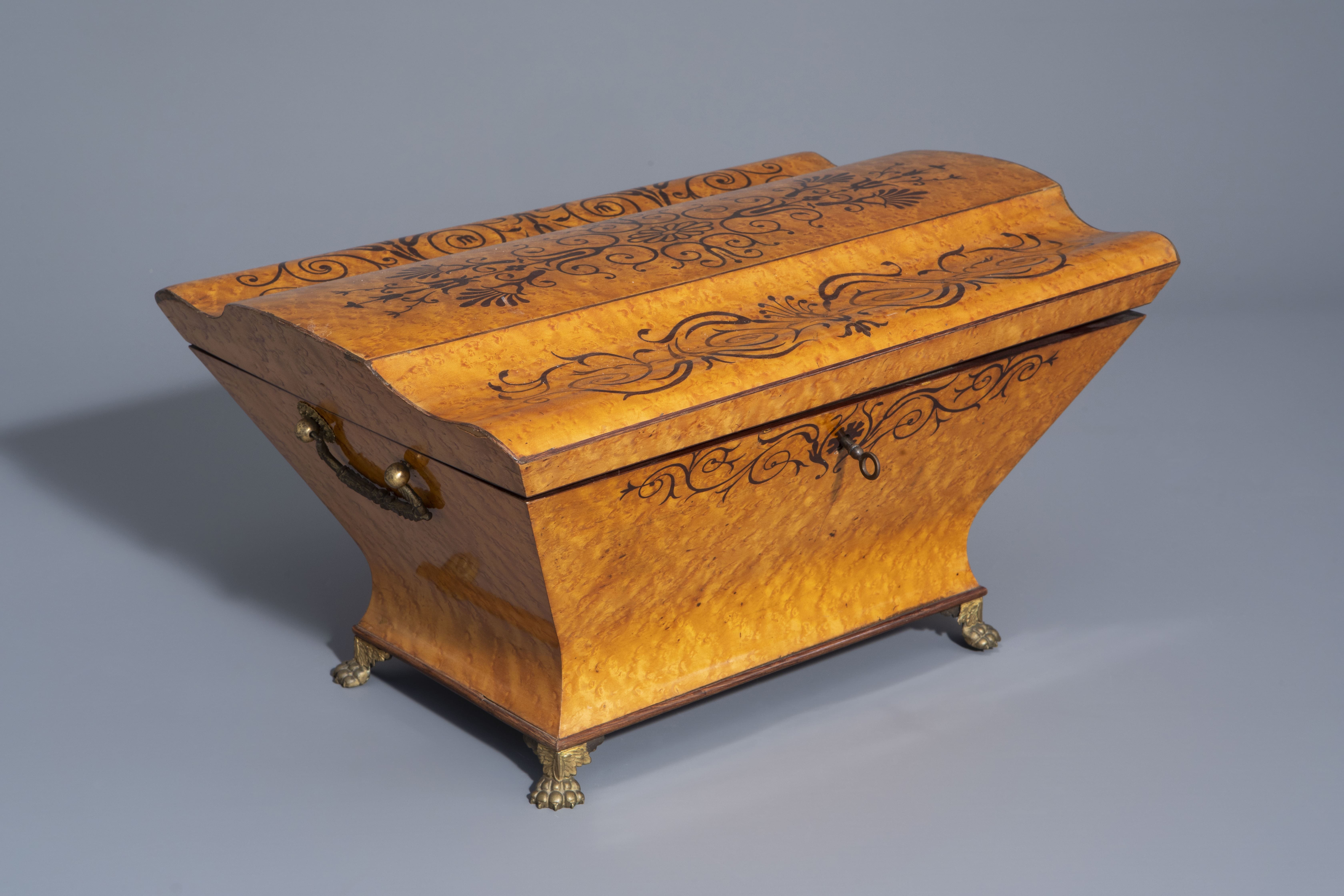 An English sarcophagus shaped burl wood veneered box, 19th/20th C.