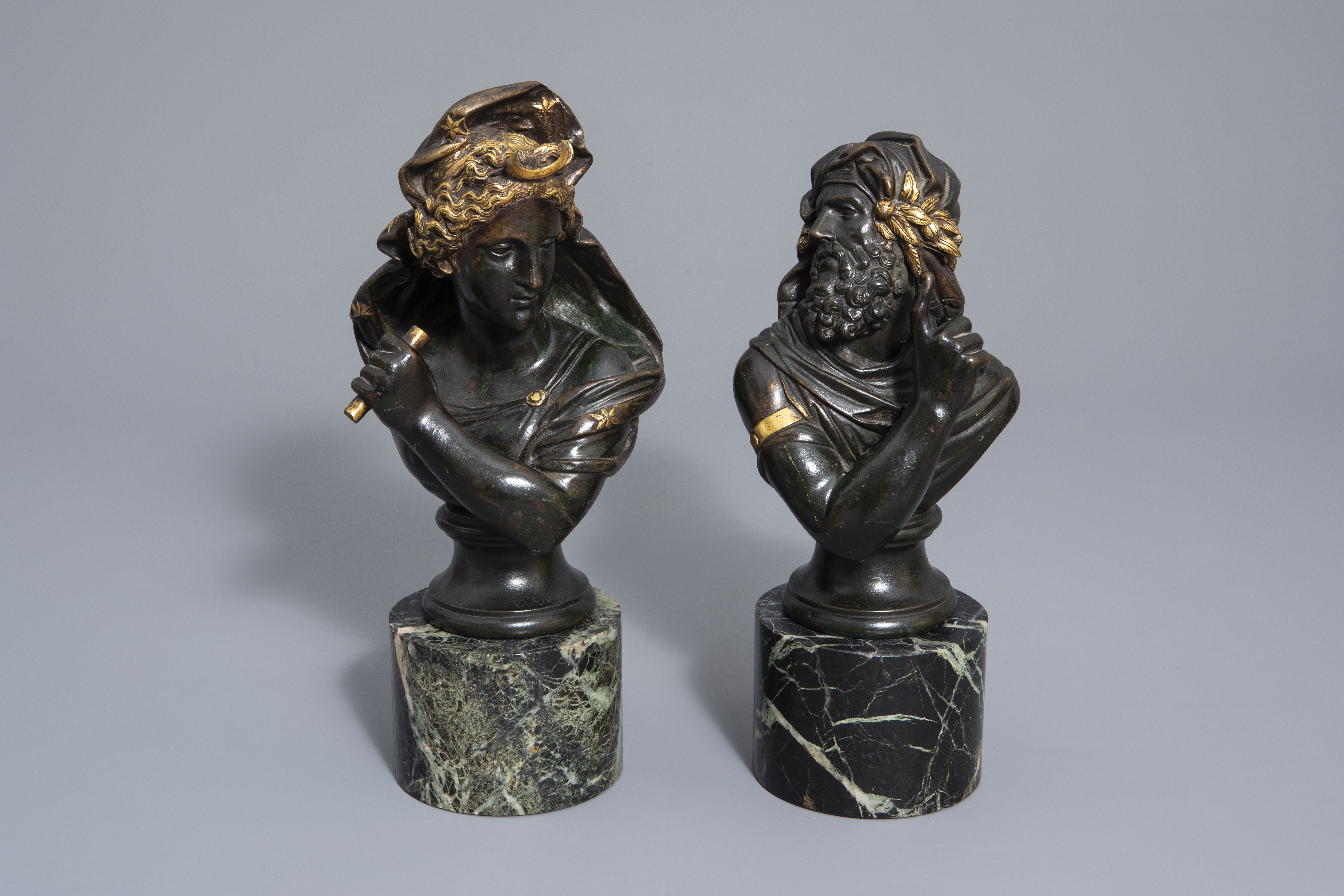 After Piat: Pair of busts after the antiques, patinated and gilt bronze on a marble base, 19th C.