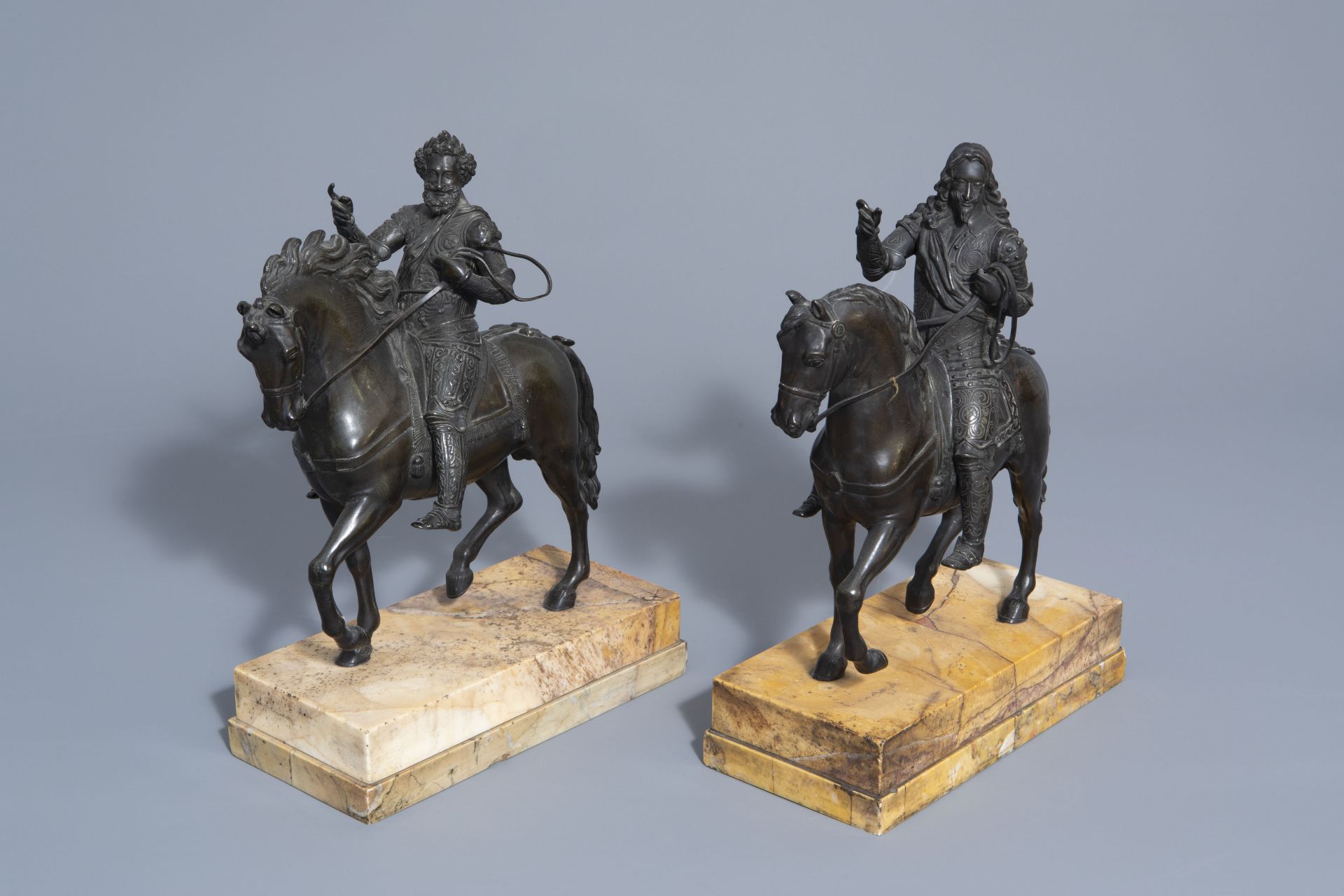 Pair of French regal bronze equestrian statues of Henry IV and Francis I on marble base, 19th C.