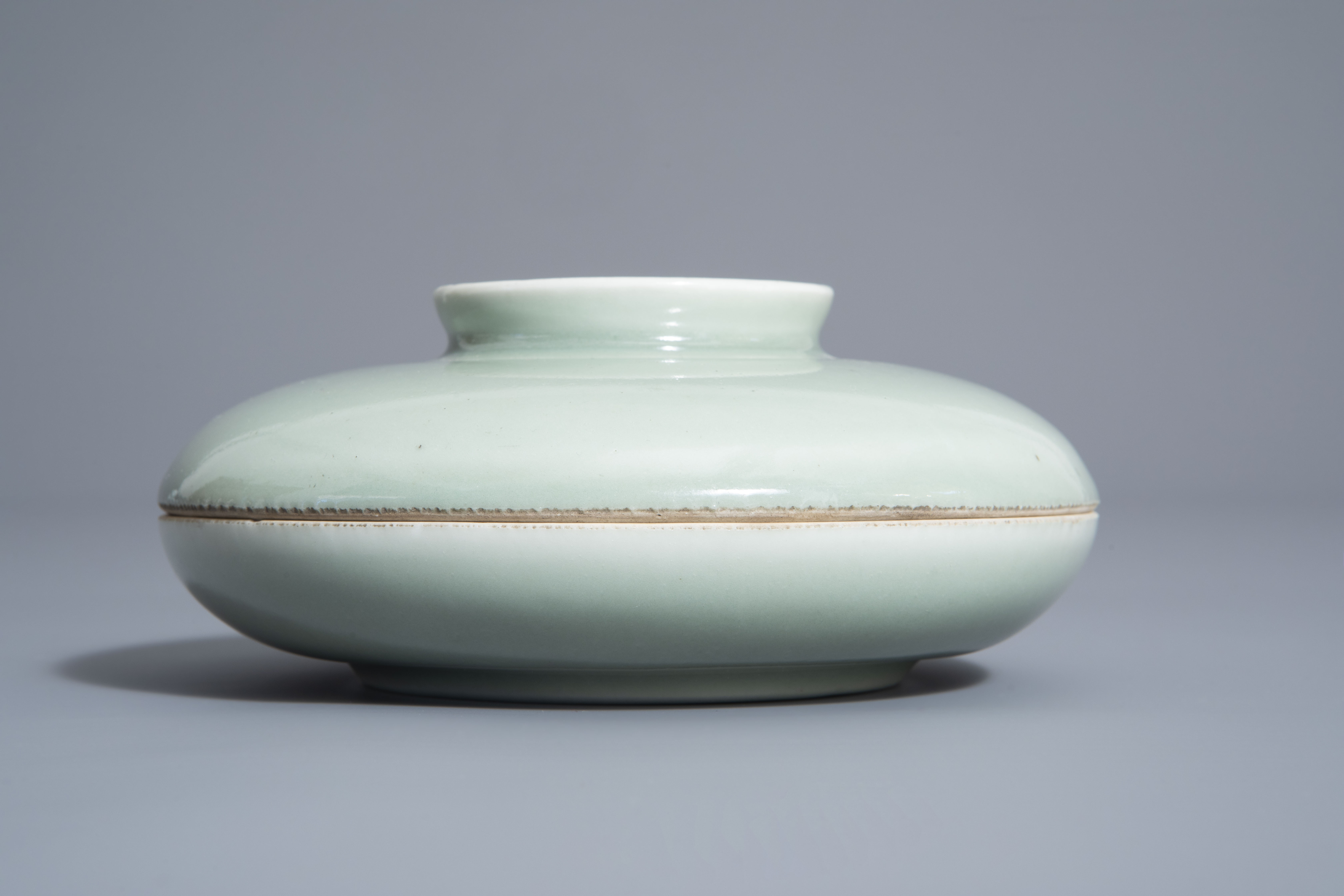 A Chinese celadon spice box, Qianlong mark, 19th C. - Image 5 of 12