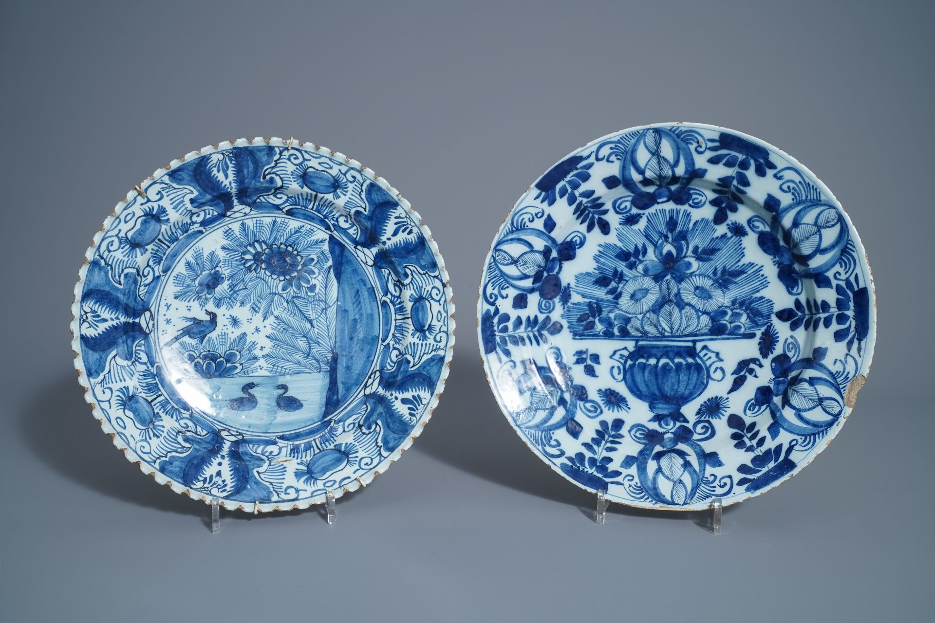Twelve polychrome and blue and white Dutch Delft plates and an oval tray, 18th C. - Image 4 of 13