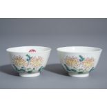 A pair of Chinese famille rose 'floral' cups, Guangxu mark, 19th/20th C.