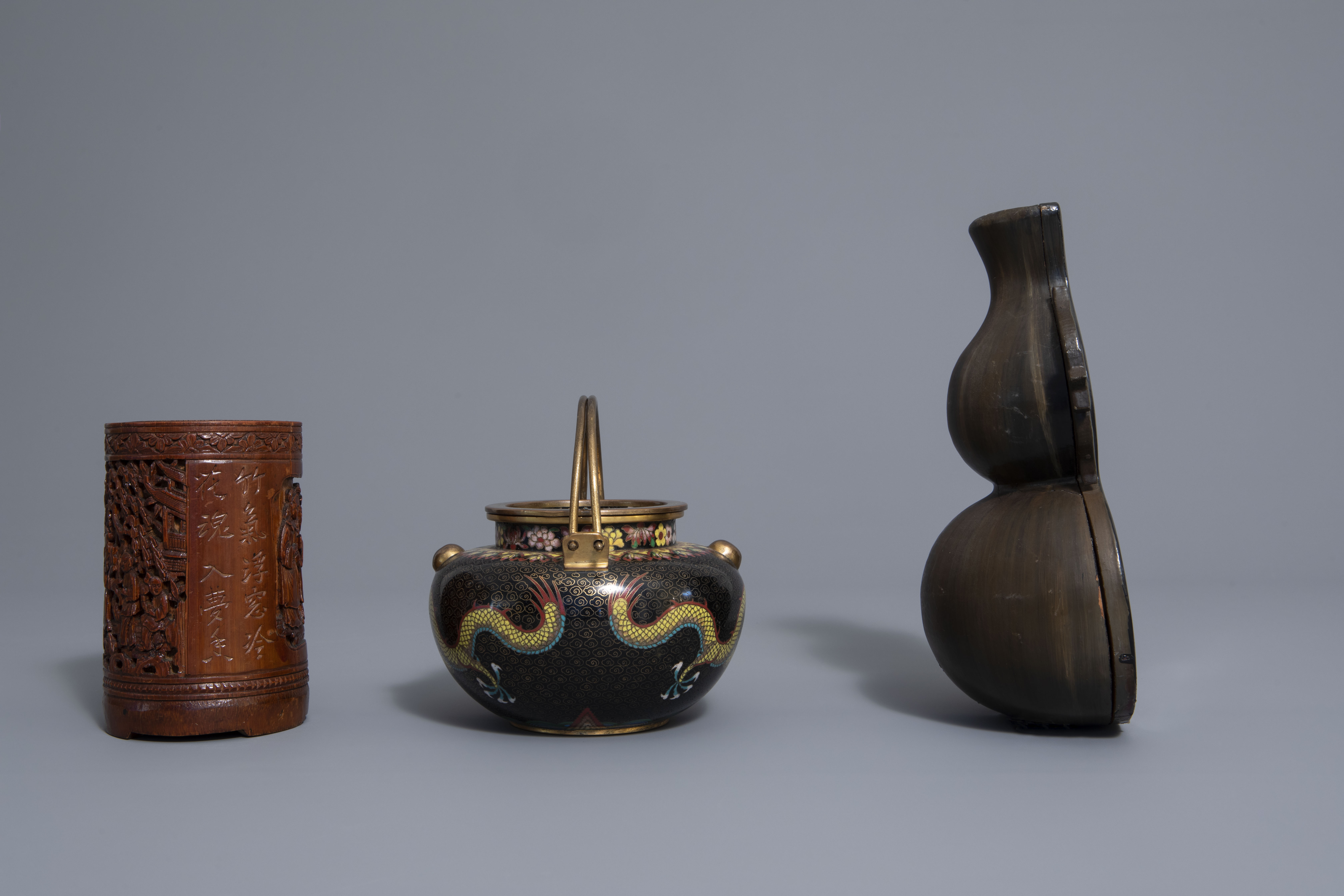 A Chinese tea block, cloisonné teapot, wall vase, bamboo brush pot & 3 red lacquer vases, 20th C. - Image 11 of 16