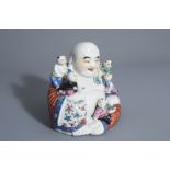 A Chinese famille rose figure of Buddha with children, 19th/20th C.