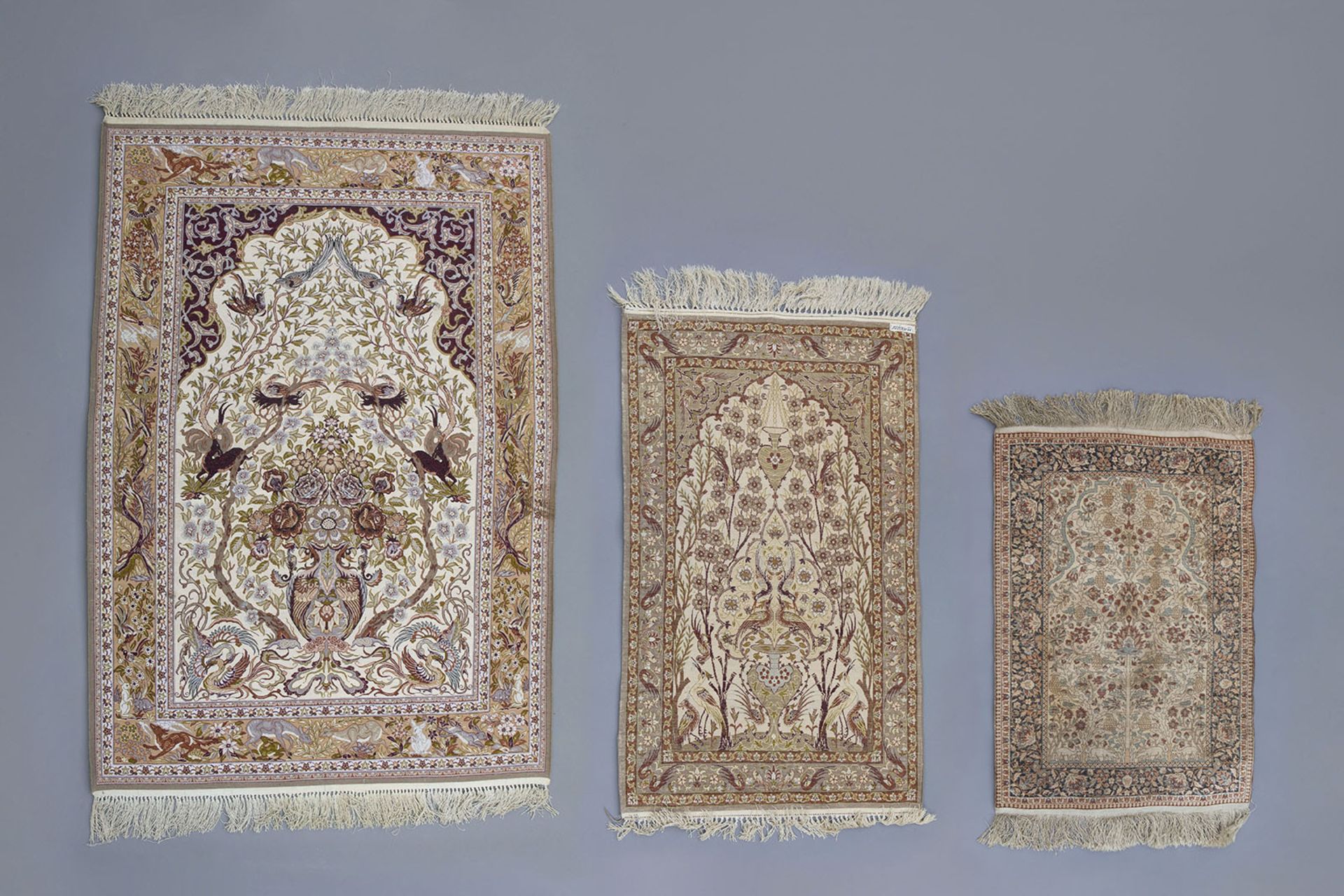 Three Oriental rugs with floral design and animals, wool and silk on cotton, Isfahan, 20th C. - Bild 2 aus 5